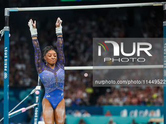 Simone Biles of United States performing on the Uneven Bars during  the Artistic Gymnastics Women's All-Around Final on day six of the Olymp...