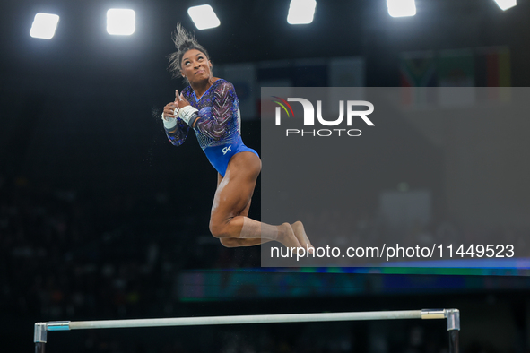 Simone Biles of United States performing on the Uneven Bars during  the Artistic Gymnastics Women's All-Around Final on day six of the Olymp...