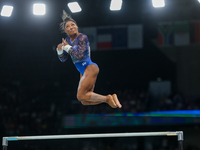 Simone Biles of United States performing on the Uneven Bars during  the Artistic Gymnastics Women's All-Around Final on day six of the Olymp...