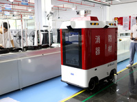 A staff member is debuting a fire intelligent patrol robot at the production line of Fu in Fuzhou, Fujian province, China, on August 1, 2024...