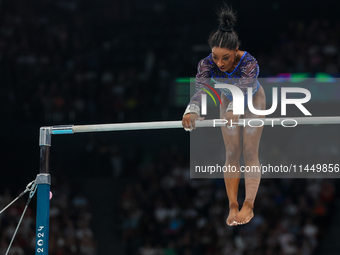 Simone Biles of United States performing on the Uneven Bars during  the Artistic Gymnastics Women's All-Around Final on day six of the Olymp...