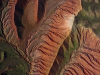 Colorful mountains are being seen on the 147 county road in Changji Hui Autonomous Prefecture, Xinjiang province, China, on July 25, 2024. (