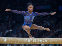 Simone Biles of Team United States competes on the balance beam during the Artistic Gymnastics Women's All-Around Final on day six of the Ol...