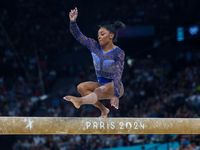 Simone Biles of Team United States competes on the balance beam during the Artistic Gymnastics Women's All-Around Final on day six of the Ol...