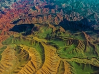 Colorful mountains are being seen on the 147 county road in Changji Hui Autonomous Prefecture, Xinjiang province, China, on July 25, 2024. (