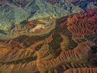 Colorful mountains are being seen on the 147 county road in Changji Hui Autonomous Prefecture, Xinjiang province, China, on July 25, 2024. (