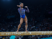 Simone Biles of Team United States competes on the balance beam during the Artistic Gymnastics Women's All-Around Final on day six of the Ol...