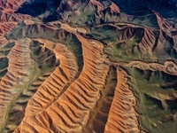 Colorful mountains are being seen on the 147 county road in Changji Hui Autonomous Prefecture, Xinjiang province, China, on July 25, 2024. (