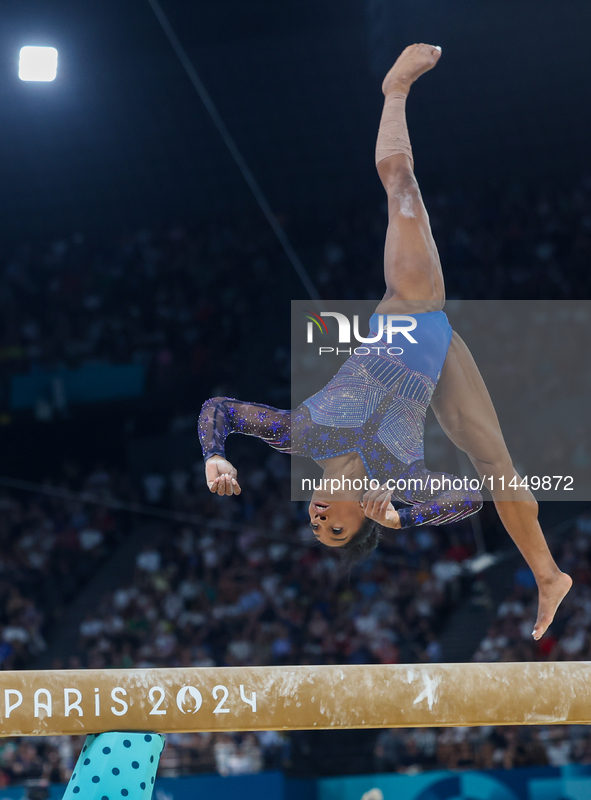 Simone Biles of Team United States competes on the balance beam during the Artistic Gymnastics Women's All-Around Final on day six of the Ol...