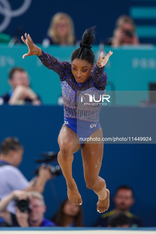 Simone Biles of Team United States competes in the floor exercise during the Artistic Gymnastics Women's All-Around Final on day six of the...