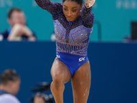 Simone Biles of Team United States competes in the floor exercise during the Artistic Gymnastics Women's All-Around Final on day six of the...