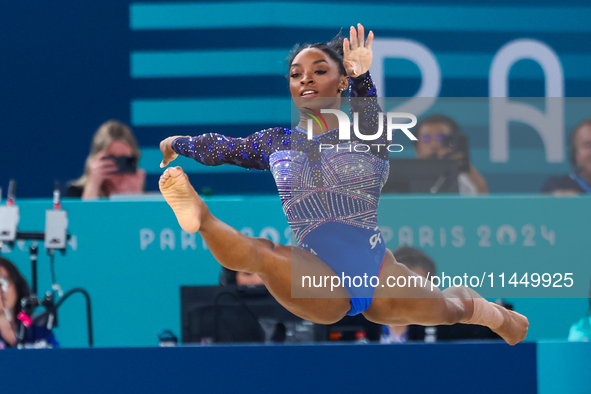 Simone Biles of Team United States competes in the floor exercise during the Artistic Gymnastics Women's All-Around Final on day six of the...