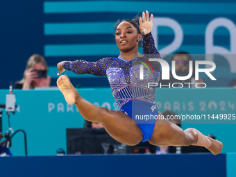 Simone Biles of Team United States competes in the floor exercise during the Artistic Gymnastics Women's All-Around Final on day six of the...