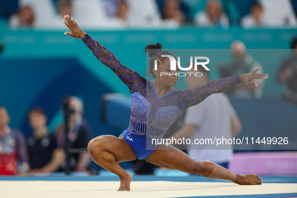 Simone Biles of Team United States competes in the floor exercise during the Artistic Gymnastics Women's All-Around Final on day six of the...