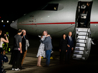 Freed prisoner Paul Whelan greets a family member after arriving at Joint Base Andrews on August 1, 2024 at Joint Base Andrews, Maryland. Th...