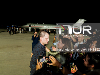 Freed prisoner Evan Gershkovich walks off a plane after he arrived at Joint Base Andrews on August 1, 2024 at Joint Base Andrews, Maryland....