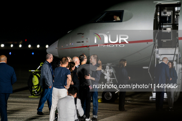 Freed prisoner Evan Gershkovich walks off a plane after he arrived at Joint Base Andrews on August 1, 2024 at Joint Base Andrews, Maryland....