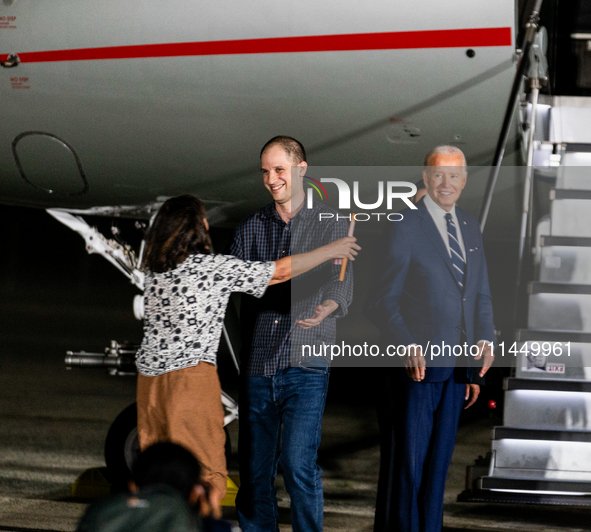 Evan Gershkovich greets his mother Ella Milman after arriving back in the United States on August 1, 2024 at Joint Base Andrews, Maryland. T...