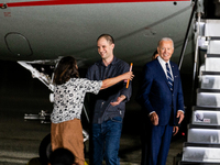 Evan Gershkovich greets his mother Ella Milman after arriving back in the United States on August 1, 2024 at Joint Base Andrews, Maryland. T...