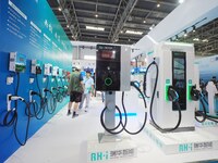 Visitors are visiting a ''smart charging pile'' at the 13th Beijing International Automobile Manufacturing Expo 2024 in Beijing, China, on A...