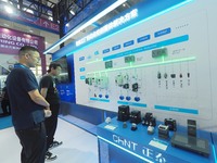 Visitors are visiting the ''Smart Factory Automation Control Total Solution'' at the 13th Beijing International Automobile Manufacturing Exp...