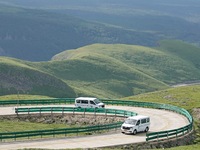 Tourists are taking a ferry bus to visit Tianchi Lake on the main peak of Changbai Mountain in Changbai Mountain, Northeast China's Jilin pr...