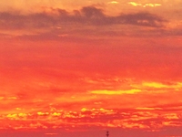 Colorful fire clouds are appearing on the Gobi Beach in Hami, Xinjiang province, China, on August 1, 2024. (