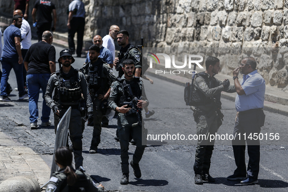 Israeli police forces are preventing Palestinian worshippers from reaching the Al-Aqsa Mosque for Friday prayers, following concerns from th...