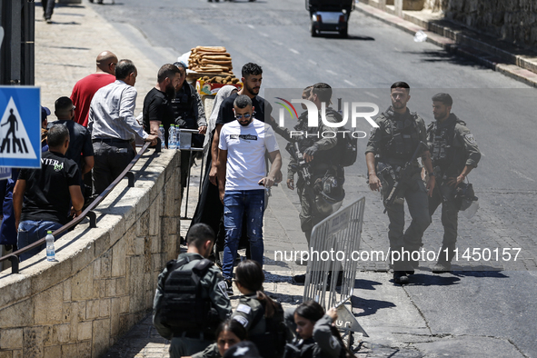 Israeli police forces are preventing Palestinian worshippers from reaching the Al-Aqsa Mosque for Friday prayers, following concerns from th...