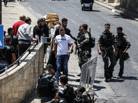 Israeli police forces are preventing Palestinian worshippers from reaching the Al-Aqsa Mosque for Friday prayers, following concerns from th...