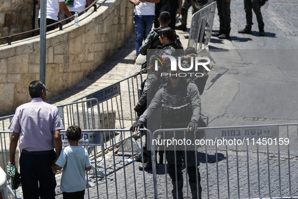 Israeli police forces are preventing Palestinian worshippers from reaching the Al-Aqsa Mosque for Friday prayers, following concerns from th...