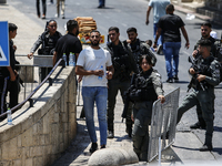 Israeli police forces are preventing Palestinian worshippers from reaching the Al-Aqsa Mosque for Friday prayers, following concerns from th...