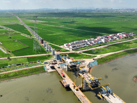 The Nanchang-Jiujiang Intercity Railway Xiu River Super Bridge is under construction in Jiujiang City, Jiangxi province, China, on August 1,...