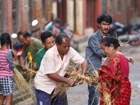 People are preparing to make the effigy of the demon deity Ghantakarna to immolate it, veering off the bad omens and warding off evil spirit...