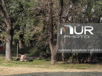 People are taking the opportunity to lie out in the sun during the afternoon in Buenos Aires, Argentina, on August 2, 2024. (