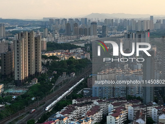 A bullet train is running in Jiujiang, China, on August 1, 2024. (