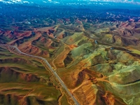 An aerial photo is showing 147 county roads among mountains in Changji Hui Autonomous Prefecture in Xinjiang province, China, on May 3, 2024...