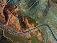 An aerial photo is showing 147 county roads among mountains in Changji Hui Autonomous Prefecture in Xinjiang province, China, on May 3, 2024...