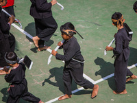 Children are taking part in the Ngemban Taun traditional ceremony on August 3, 2024, in Cireundeu Village, West Java, Indonesia. Ngemban Tau...