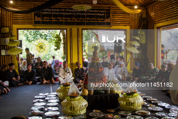 The Cireundeu Indigenous people are taking part in the Ngemban Taun traditional ceremony in Cireundeu Village, West Java, Indonesia, on Augu...