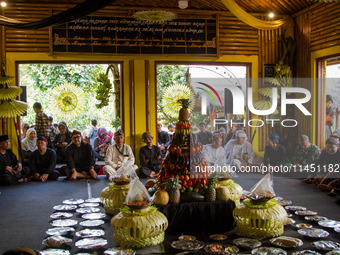 The Cireundeu Indigenous people are taking part in the Ngemban Taun traditional ceremony in Cireundeu Village, West Java, Indonesia, on Augu...