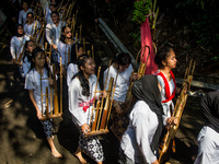 The Cireundeu Indigenous people are taking part in the Ngemban Taun traditional ceremony in Cireundeu Village, West Java, Indonesia, on Augu...