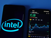 A mobile phone is showing Intel shares falling in Yichang, China, on August 3, 2024. (