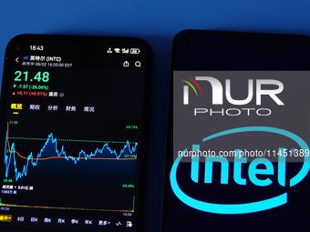 A mobile phone is showing Intel shares falling in Yichang, China, on August 3, 2024. (