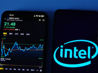 A mobile phone is showing Intel shares falling in Yichang, China, on August 3, 2024. (