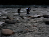 Tourists are enjoying in River Lidder on a hot summer day in Pahalgam, Jammu and Kashmir, India, on August 3, 2024. (