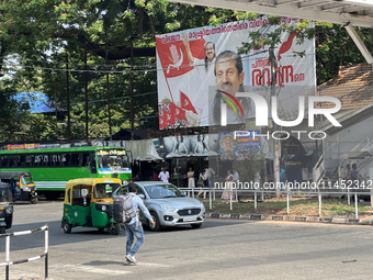 A large political banner for LDF Party candidate Pannian Raveendran is being displayed for the upcoming Lok Sabha 2024 election in Thiruvana...