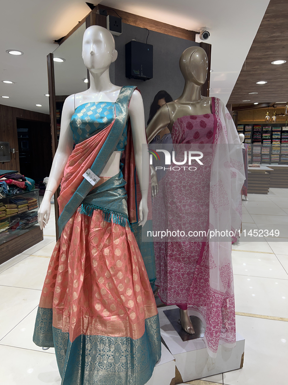 Fancy sarees are being displayed at a textile shop in Thiruvananthapuram, Kerala, India, on April 10, 2024. 