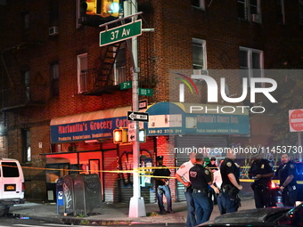 Five people are being injured in a stabbing attack as a result of a dispute at 100th Street and 37th Avenue in Queens, New York, United Stat...