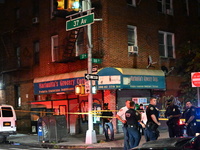 Five people are being injured in a stabbing attack as a result of a dispute at 100th Street and 37th Avenue in Queens, New York, United Stat...